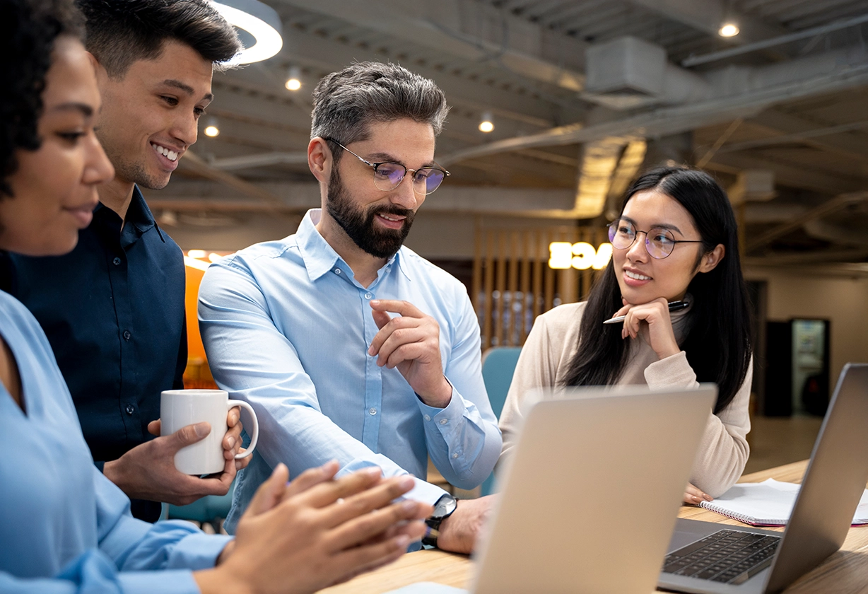 Four people in a team discussion