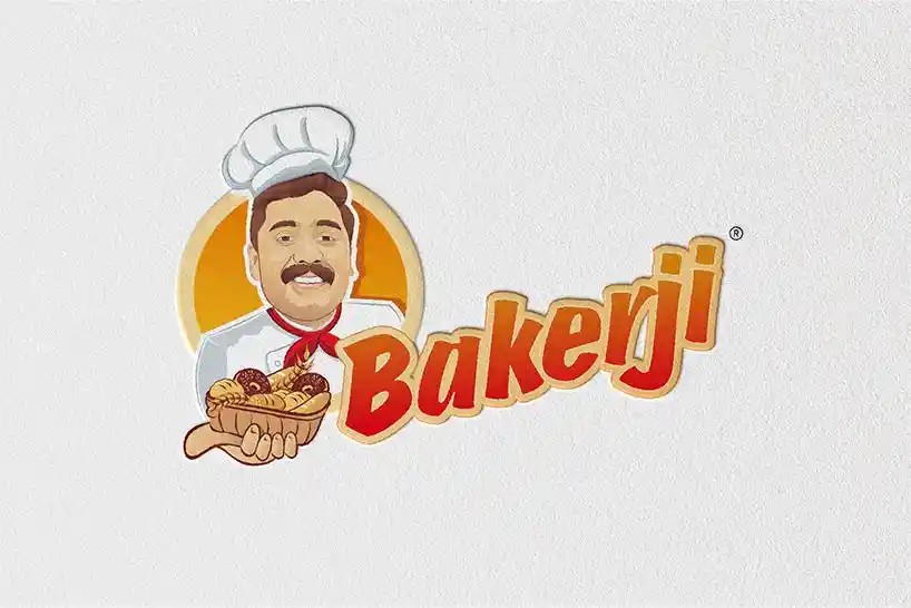 Bakerji brand’s orange coloured logo set against a gray background
