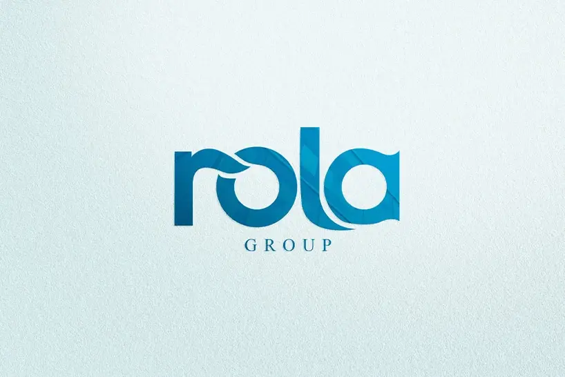 Rola group’s blue coloured logo set against a gray background