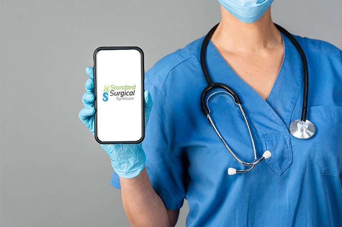 Standard Surgical | Nurse holding a phone